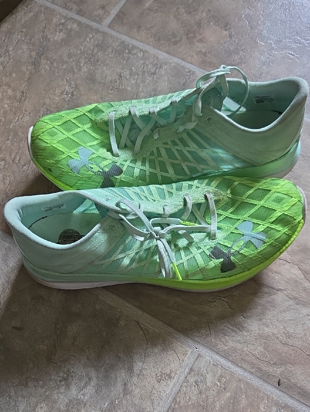 Under Armour Flow Velociti Elite running shoes in a lime green colorway